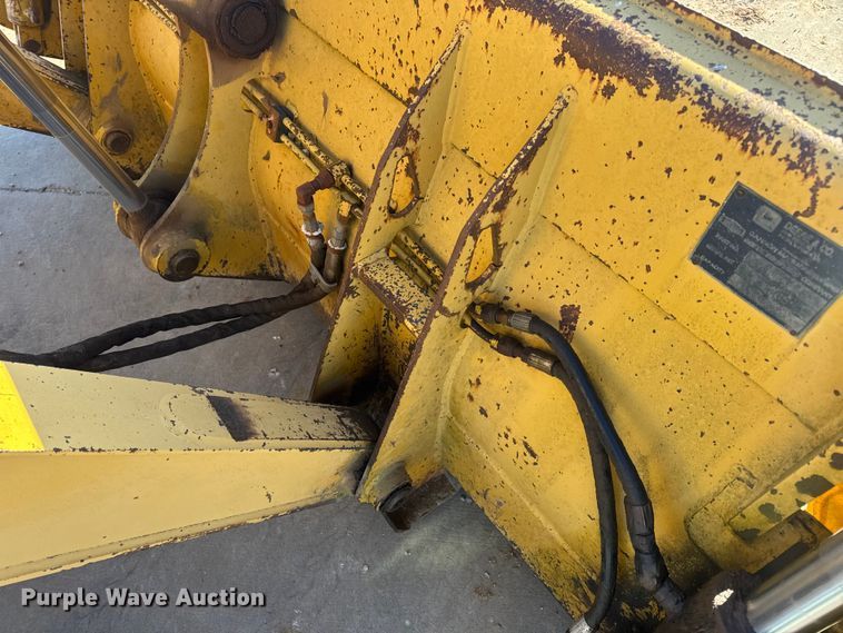 image for item EN0884 1999 John Deere 310SE backhoe