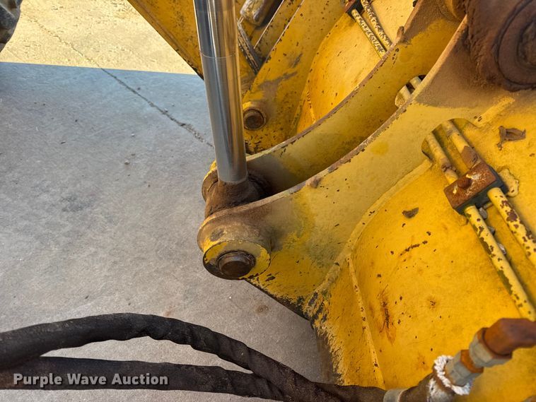 image for item EN0884 1999 John Deere 310SE backhoe