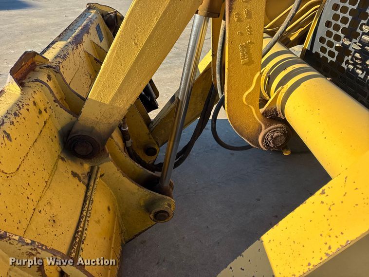 image for item EN0884 1999 John Deere 310SE backhoe