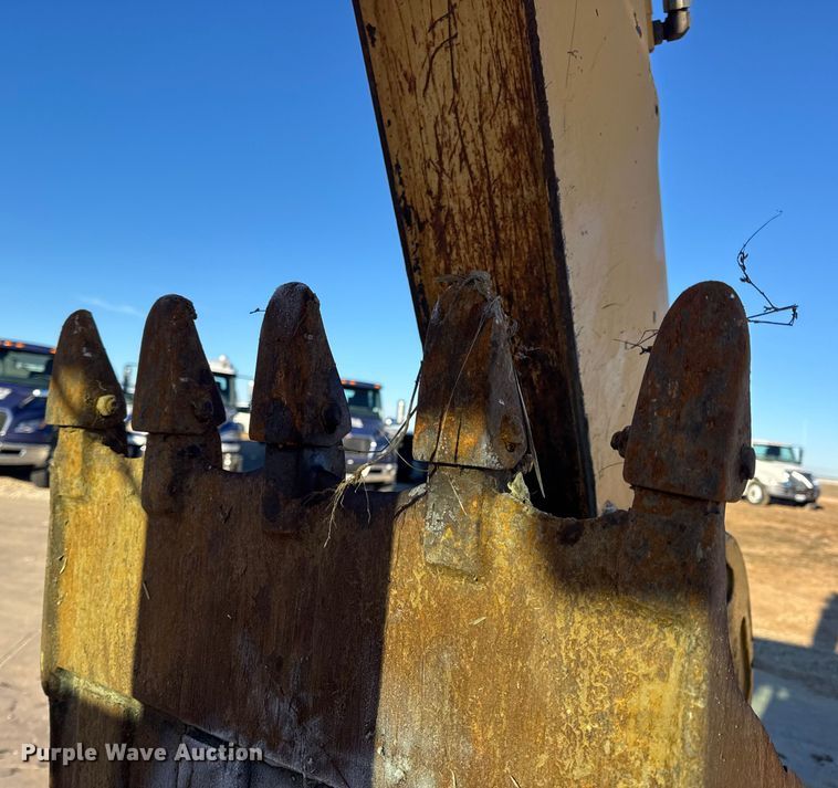 image for item EN0884 1999 John Deere 310SE backhoe