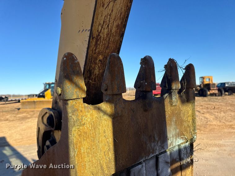 image for item EN0884 1999 John Deere 310SE backhoe