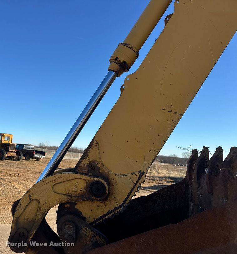 image for item EN0884 1999 John Deere 310SE backhoe