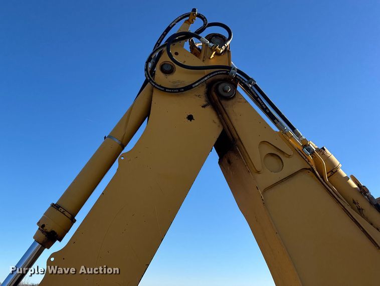 image for item EN0884 1999 John Deere 310SE backhoe