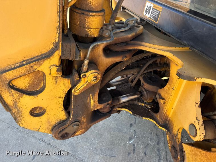 image for item EN0884 1999 John Deere 310SE backhoe