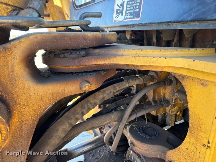 image for item EN0884 1999 John Deere 310SE backhoe