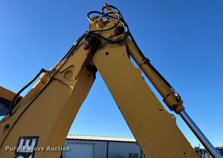 image for item EN0884 1999 John Deere 310SE backhoe