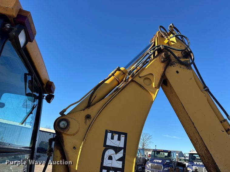 image for item EN0884 1999 John Deere 310SE backhoe