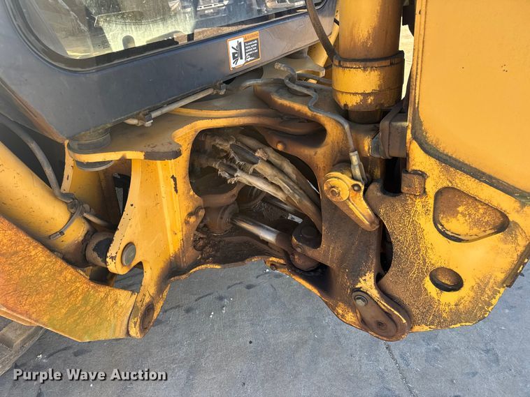 image for item EN0884 1999 John Deere 310SE backhoe
