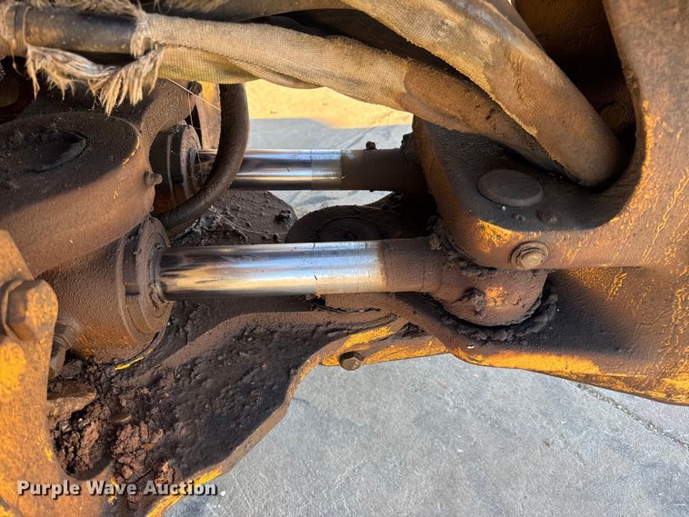 image for item EN0884 1999 John Deere 310SE backhoe