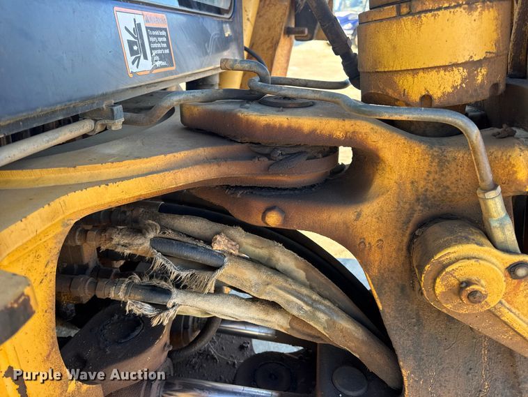 image for item EN0884 1999 John Deere 310SE backhoe