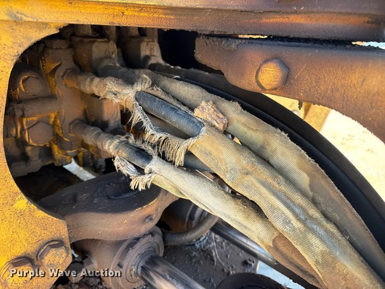 image for item EN0884 1999 John Deere 310SE backhoe