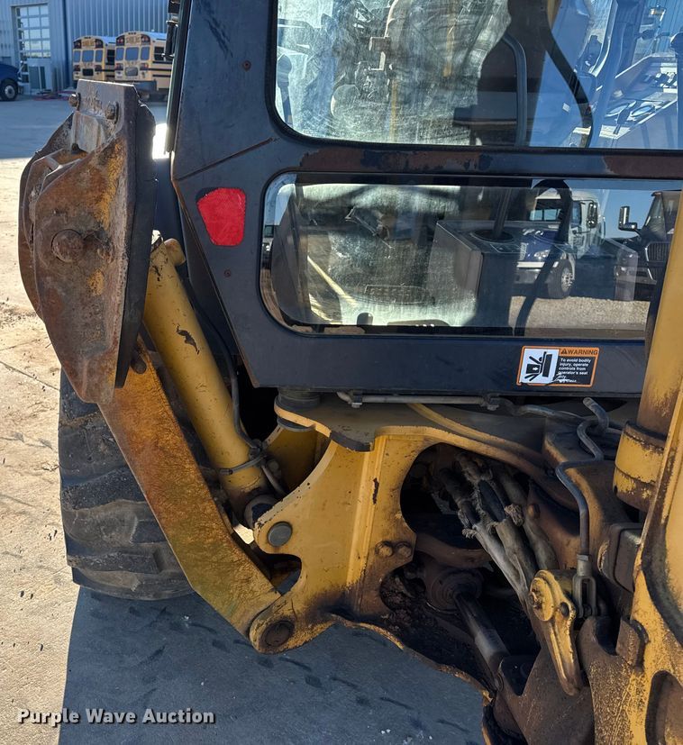 image for item EN0884 1999 John Deere 310SE backhoe