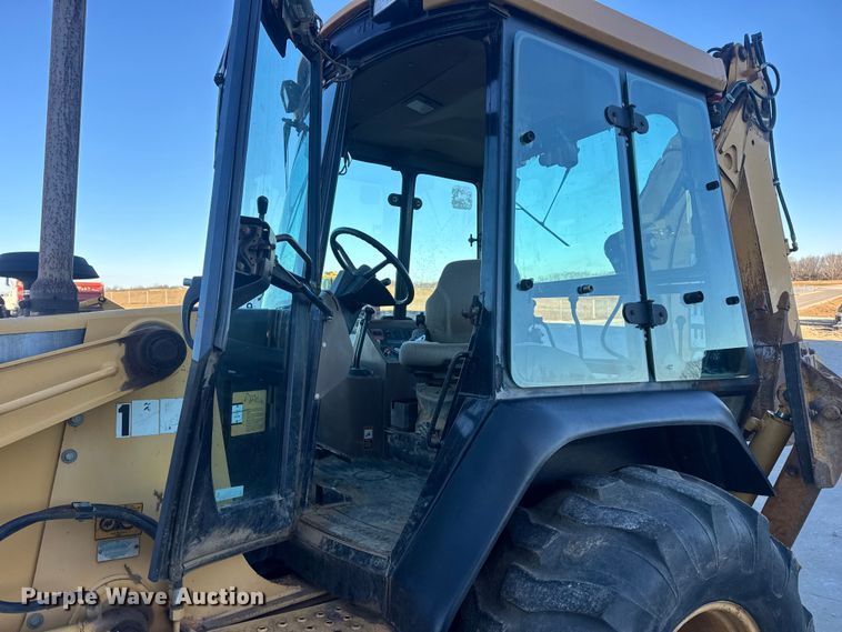 image for item EN0884 1999 John Deere 310SE backhoe