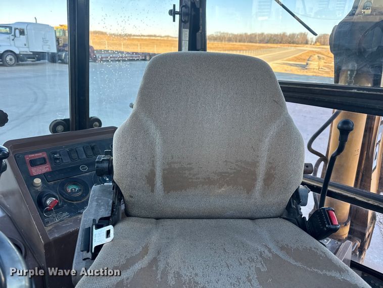 image for item EN0884 1999 John Deere 310SE backhoe