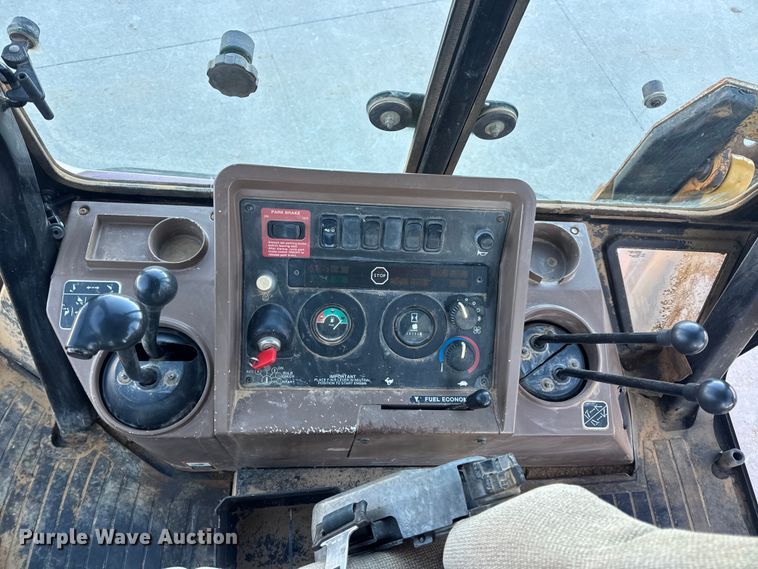 image for item EN0884 1999 John Deere 310SE backhoe