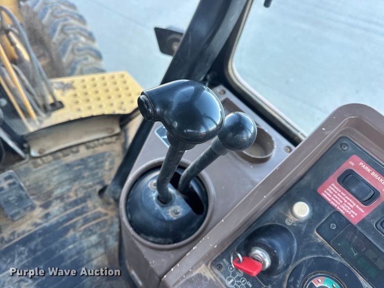 image for item EN0884 1999 John Deere 310SE backhoe