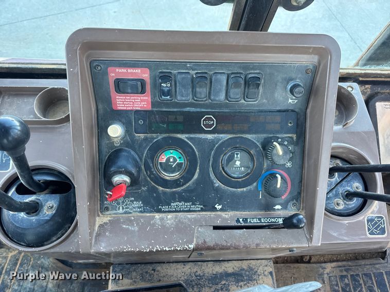 image for item EN0884 1999 John Deere 310SE backhoe