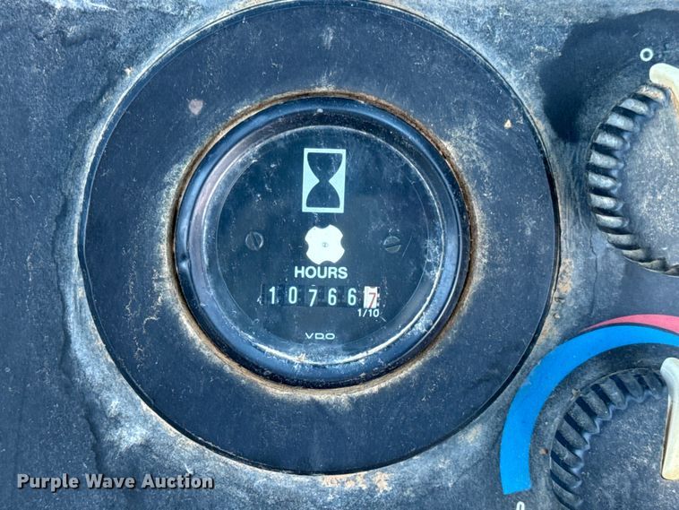 image for item EN0884 1999 John Deere 310SE backhoe