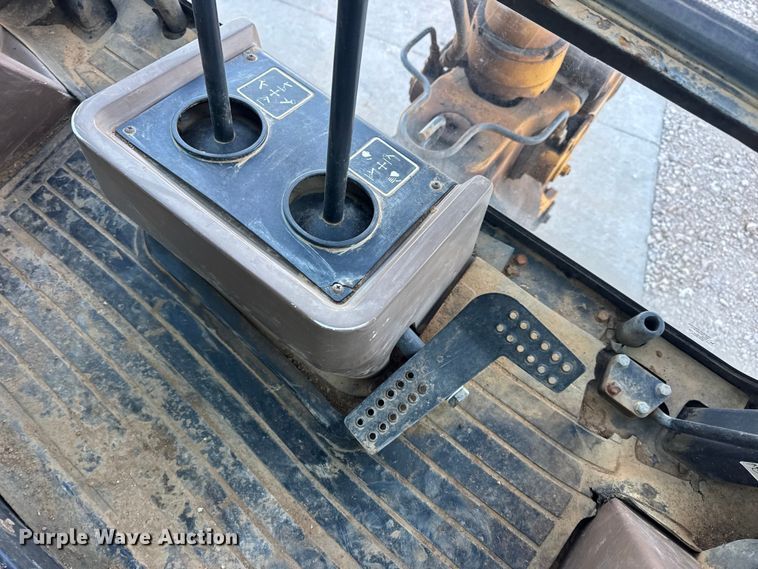 image for item EN0884 1999 John Deere 310SE backhoe