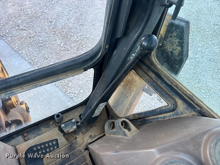 image for item EN0884 1999 John Deere 310SE backhoe