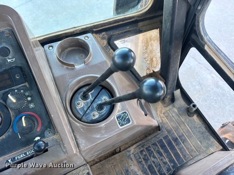 image for item EN0884 1999 John Deere 310SE backhoe