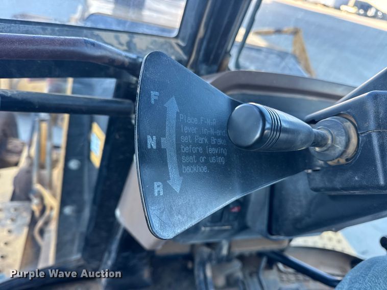 image for item EN0884 1999 John Deere 310SE backhoe