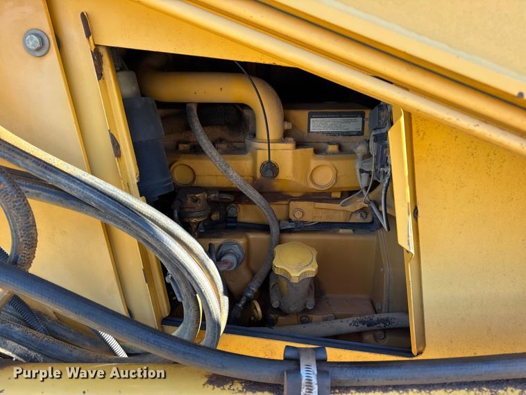 image for item EN0884 1999 John Deere 310SE backhoe