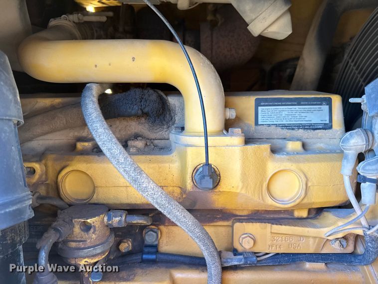 image for item EN0884 1999 John Deere 310SE backhoe