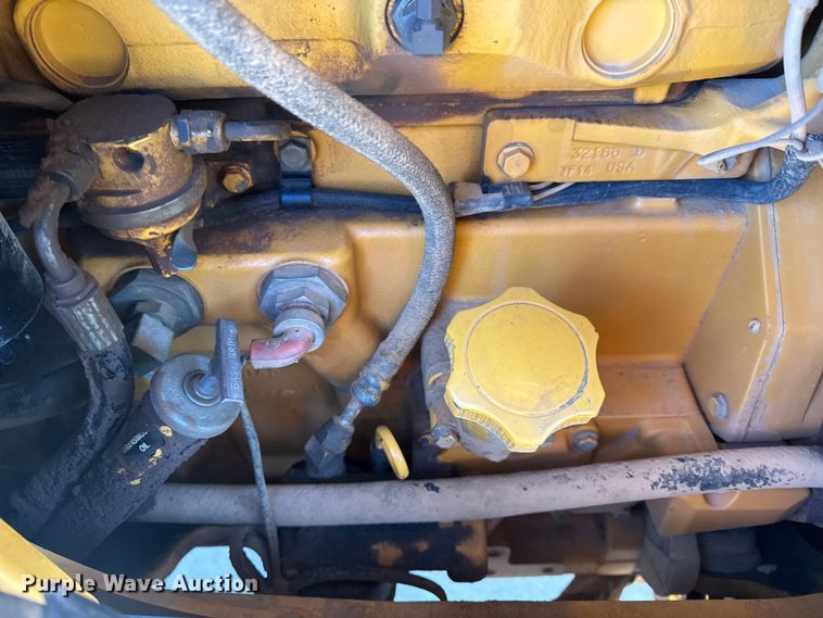 image for item EN0884 1999 John Deere 310SE backhoe