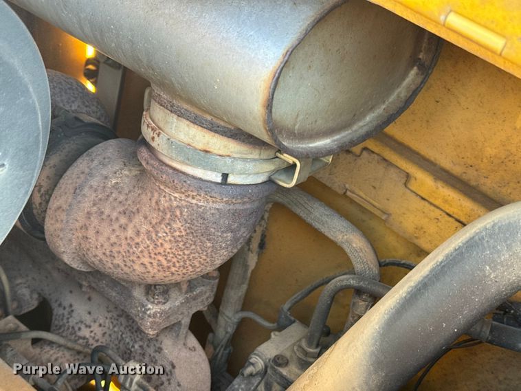 image for item EN0884 1999 John Deere 310SE backhoe