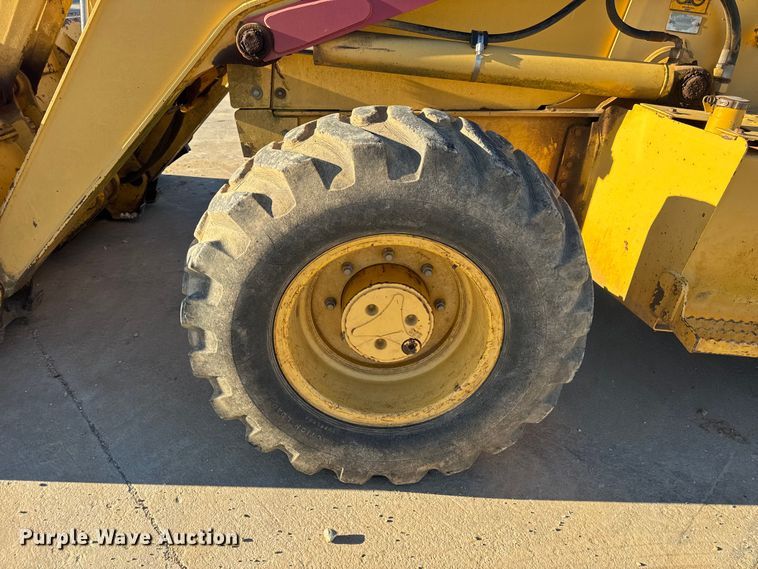 image for item EN0884 1999 John Deere 310SE backhoe