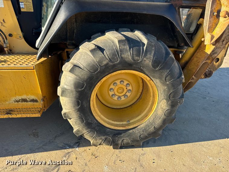 image for item EN0884 1999 John Deere 310SE backhoe