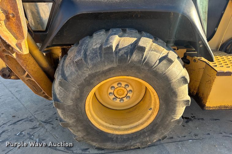 image for item EN0884 1999 John Deere 310SE backhoe