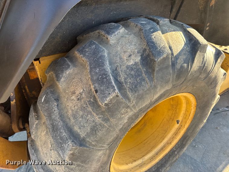 image for item EN0884 1999 John Deere 310SE backhoe