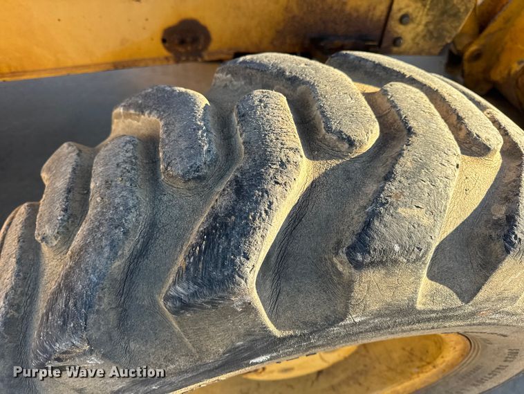 image for item EN0884 1999 John Deere 310SE backhoe