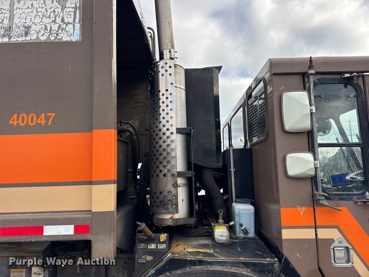 image for item ER0387 2001 Crane Carrier Company refuse truck