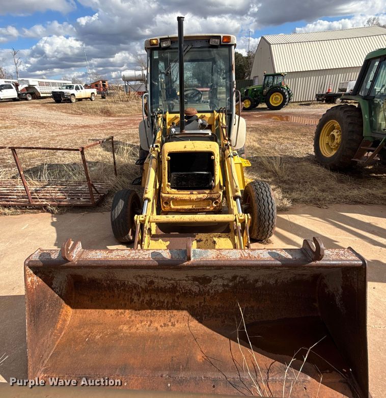 image for item ES5652 1997 New Holland 555E backhoe