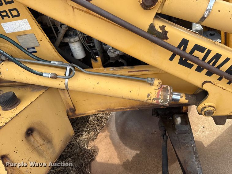 image for item ES5652 1997 New Holland 555E backhoe
