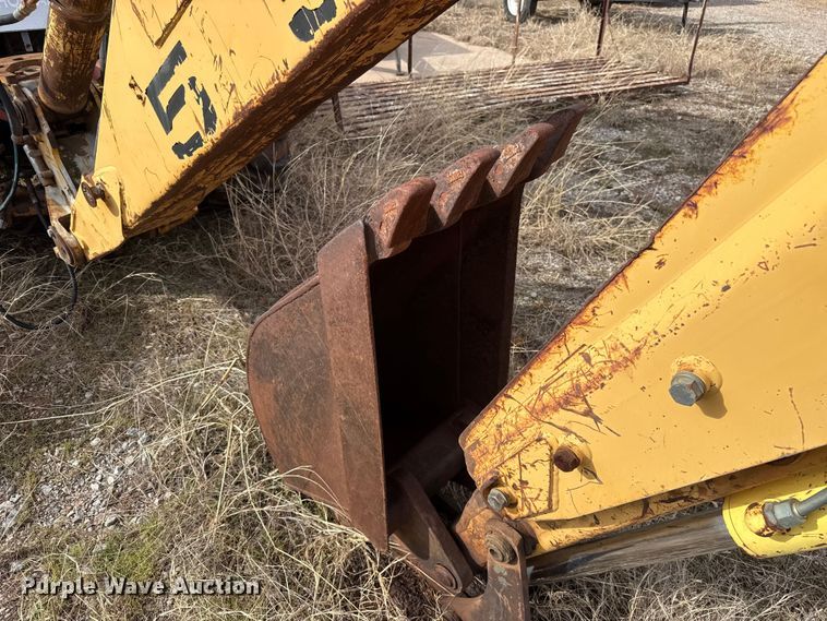 image for item ES5652 1997 New Holland 555E backhoe