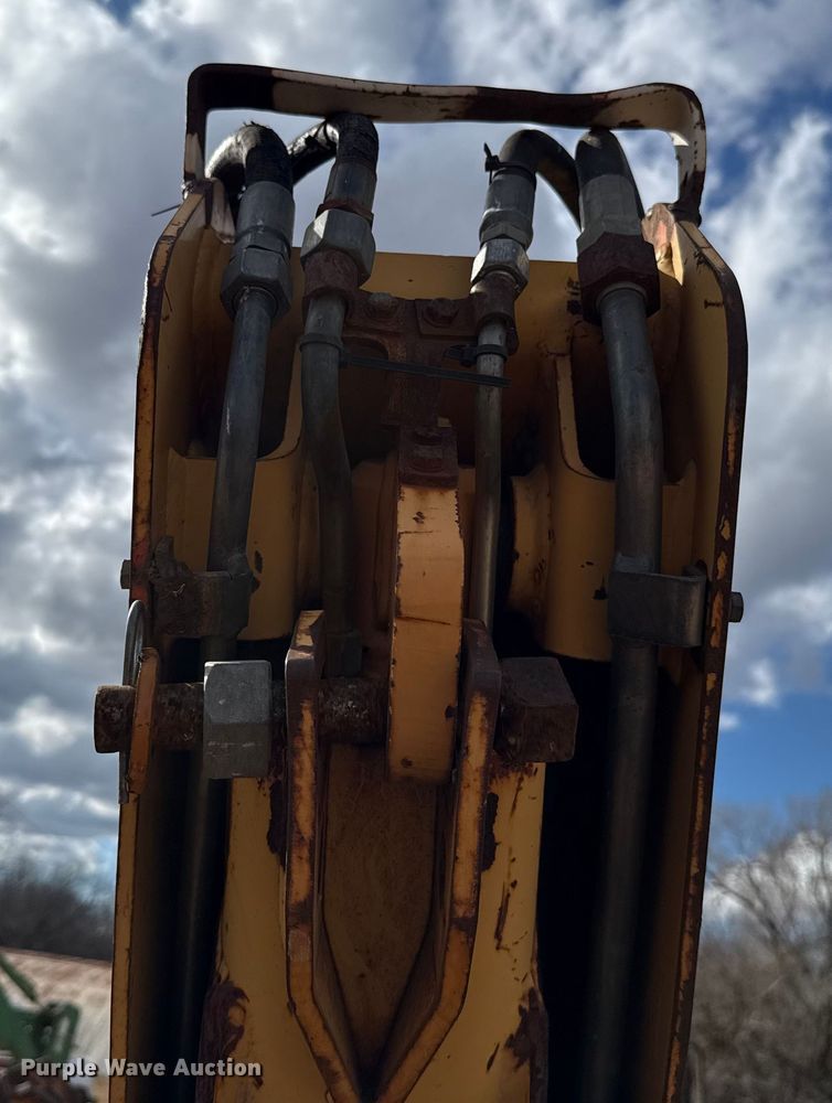 image for item ES5652 1997 New Holland 555E backhoe