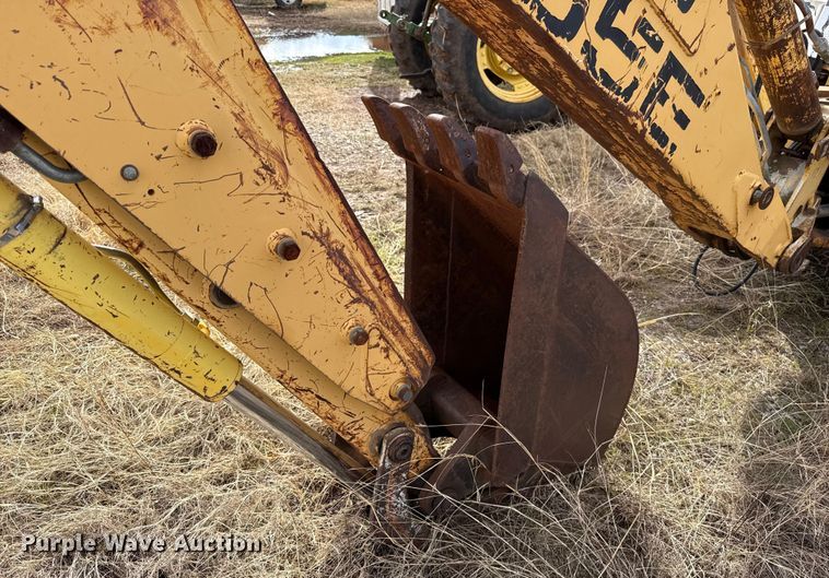 image for item ES5652 1997 New Holland 555E backhoe