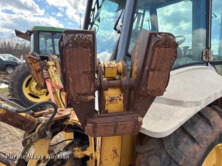 image for item ES5652 1997 New Holland 555E backhoe