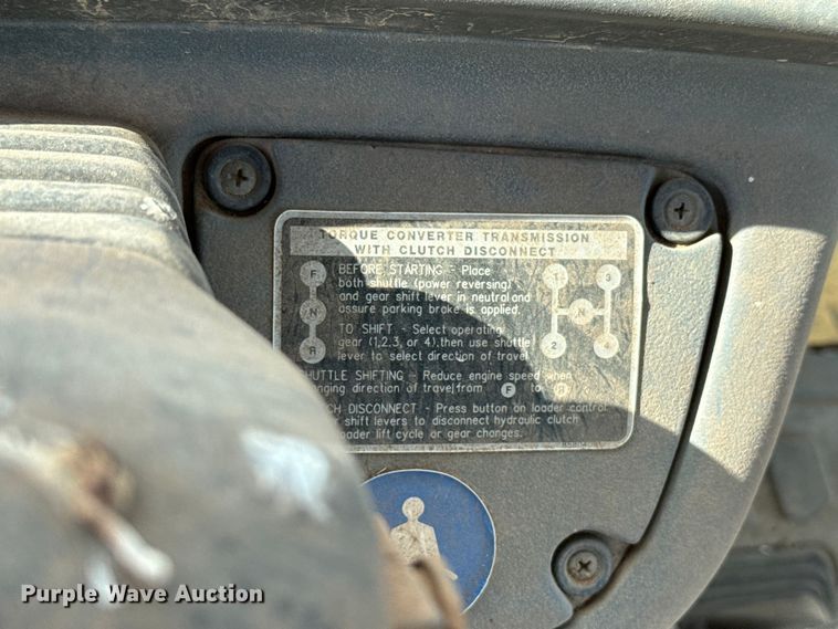 image for item ES5652 1997 New Holland 555E backhoe