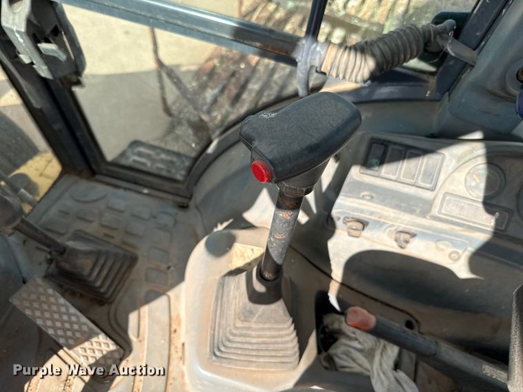 image for item ES5652 1997 New Holland 555E backhoe