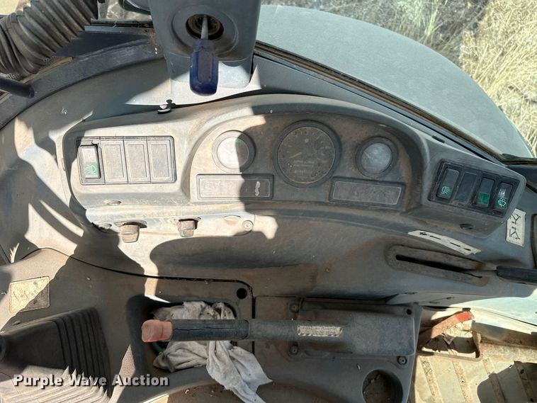 image for item ES5652 1997 New Holland 555E backhoe