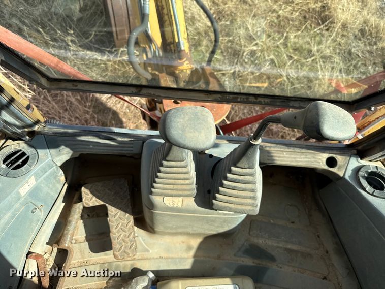 image for item ES5652 1997 New Holland 555E backhoe