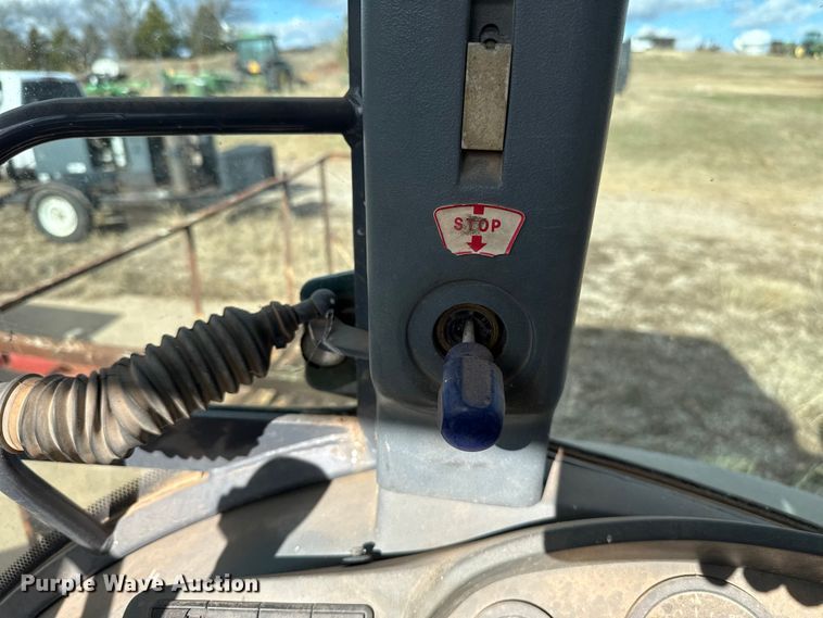 image for item ES5652 1997 New Holland 555E backhoe