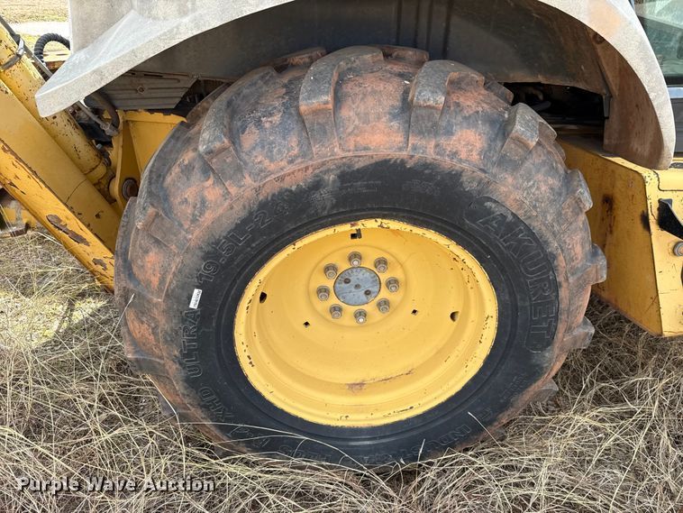 image for item ES5652 1997 New Holland 555E backhoe