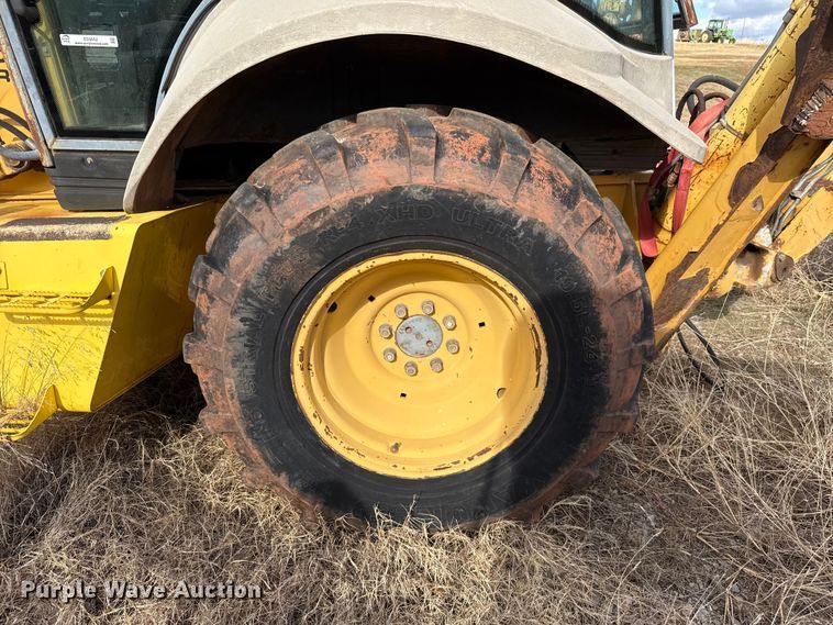 image for item ES5652 1997 New Holland 555E backhoe