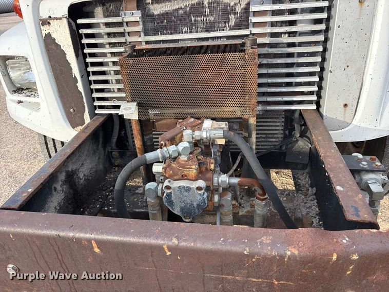 image for item ET7487 1999 Freightliner FL70 oil distributor truck